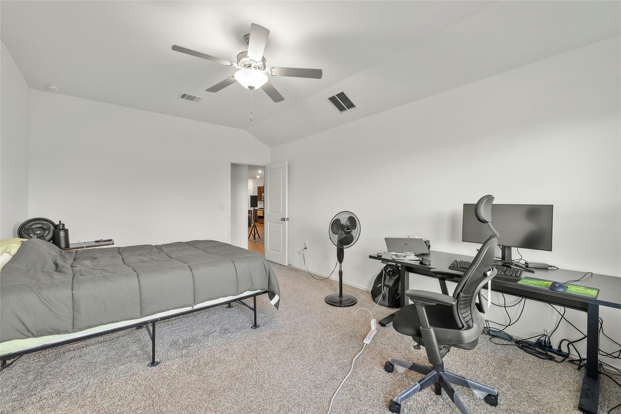 11813 Roscommon Trail Austin, TX 78754 - Photo 21 of 28 a living room with furniture and a ceiling fan