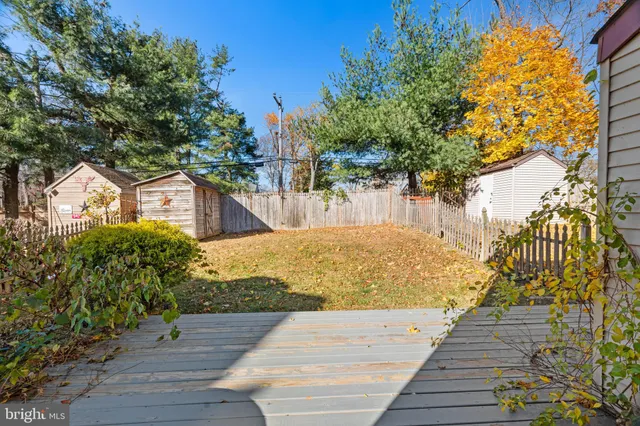 a view of a backyard of the house