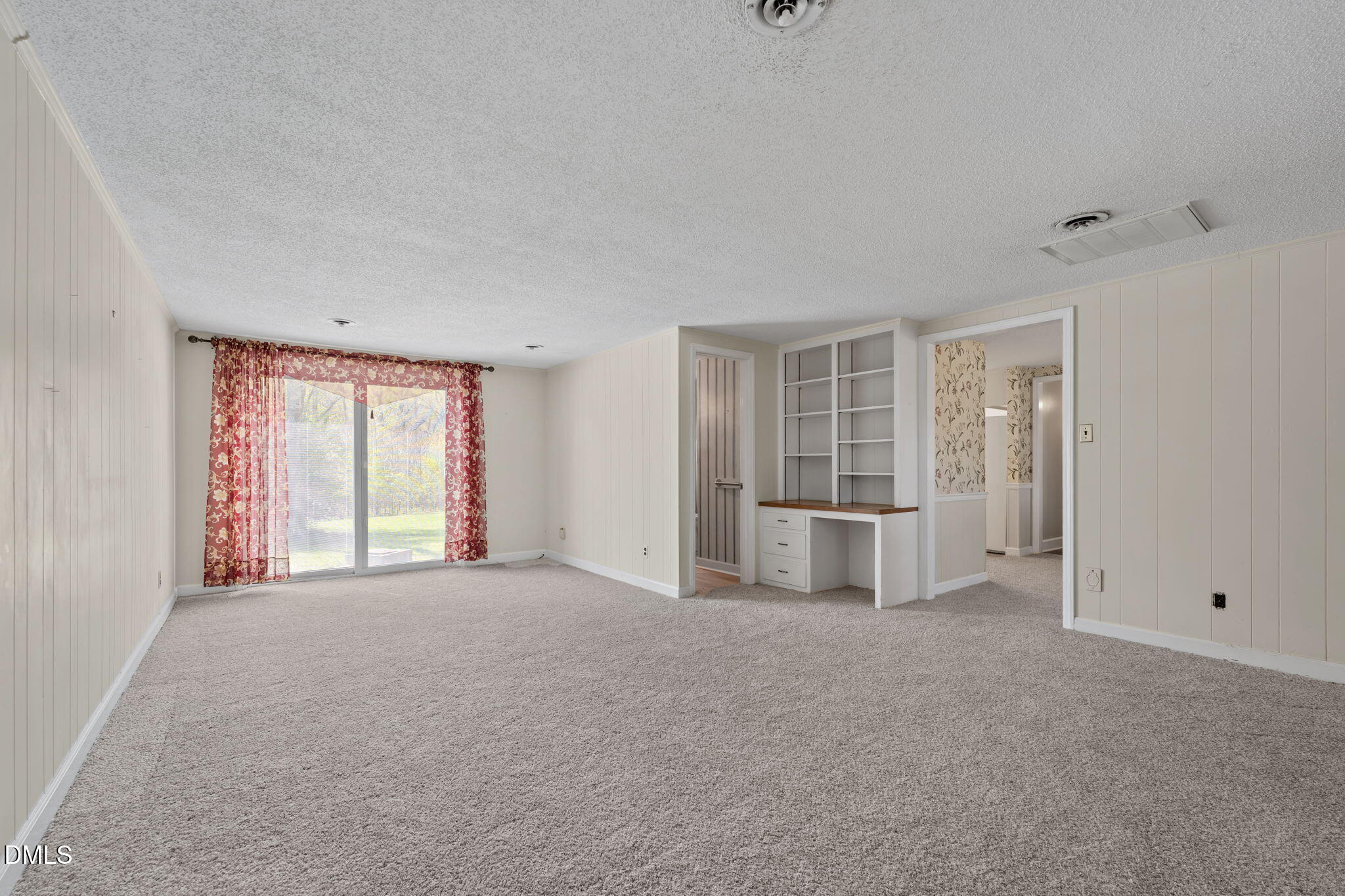 2251 Castle Rock Farm Road Pittsboro, NC 27312 - Photo 14 of 78 a view of empty room with a windows and closet
