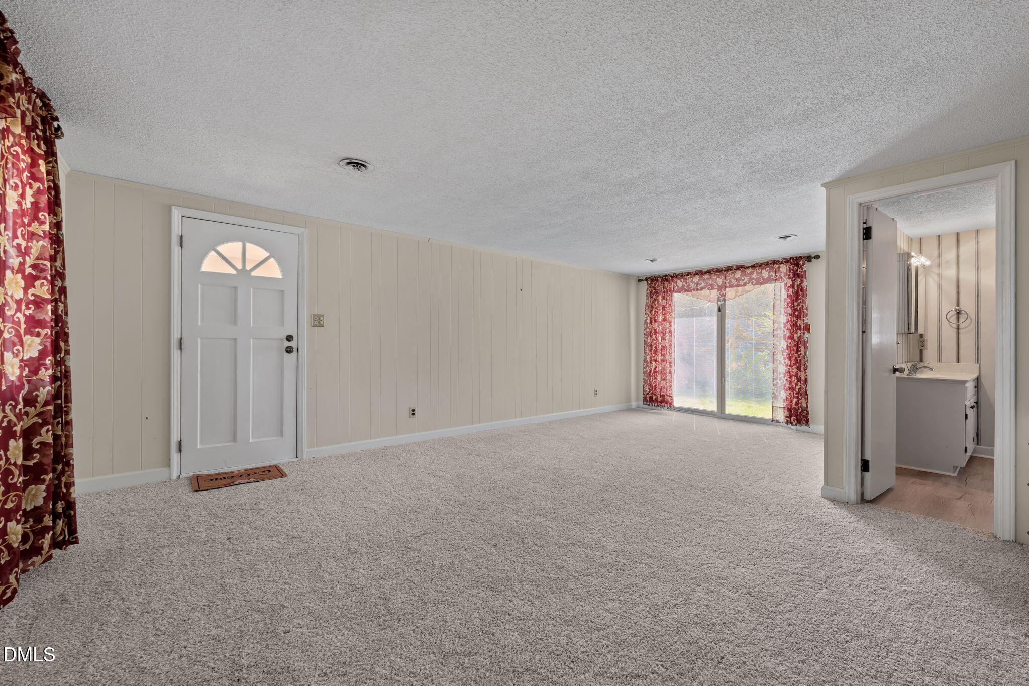 2251 Castle Rock Farm Road Pittsboro, NC 27312 - Photo 16 of 78 a view of an empty room with a window