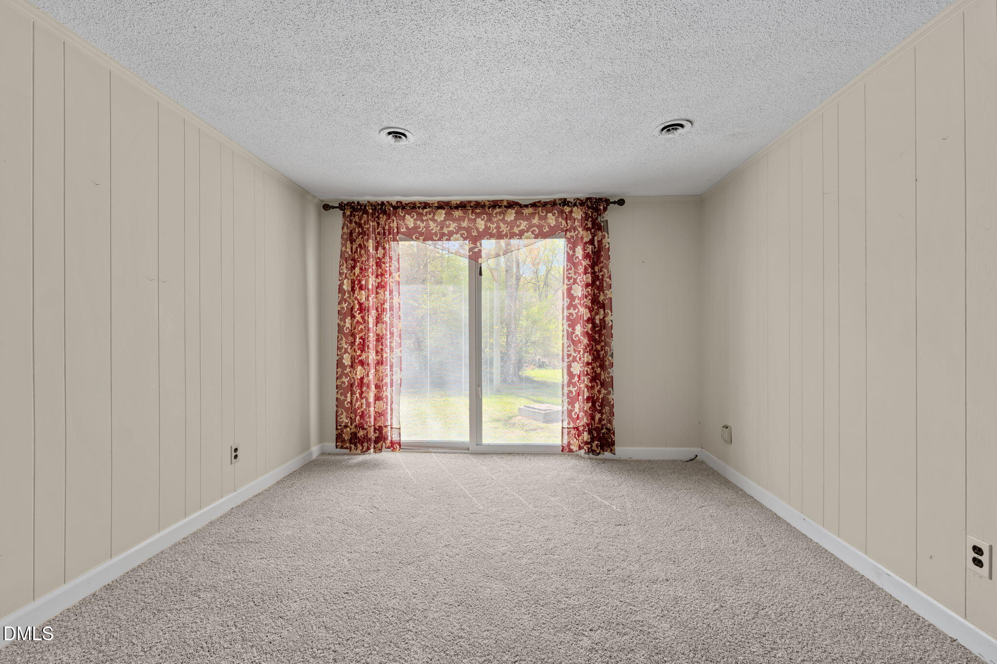 2251 Castle Rock Farm Road Pittsboro, NC 27312 - Photo 17 of 78 a view of an empty room with a window
