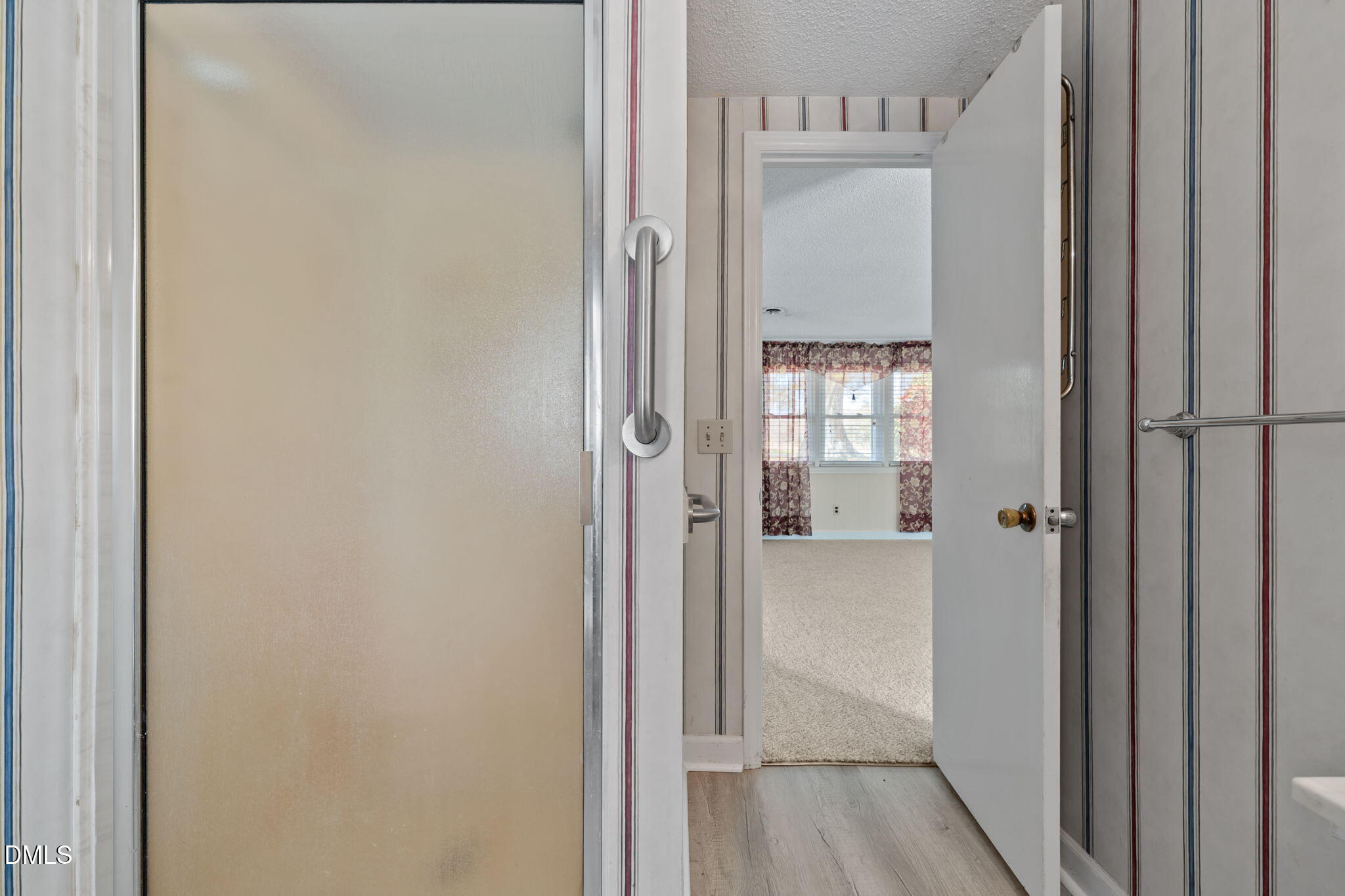 2251 Castle Rock Farm Road Pittsboro, NC 27312 - Photo 20 of 78 a view of a bathroom from a hallway