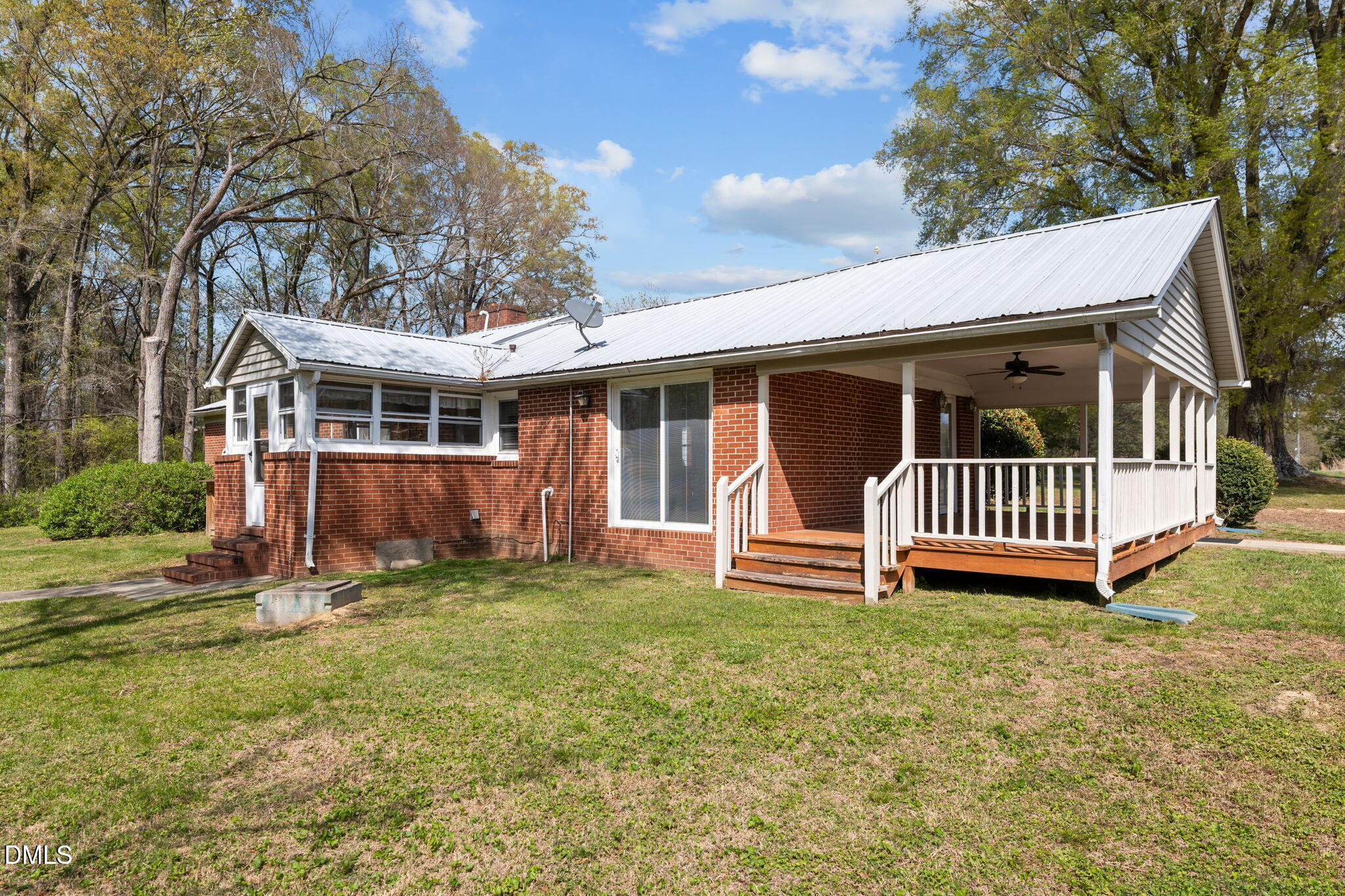 2251 Castle Rock Farm Road Pittsboro, NC 27312 - Photo 2 of 78 front view of a house with a yard