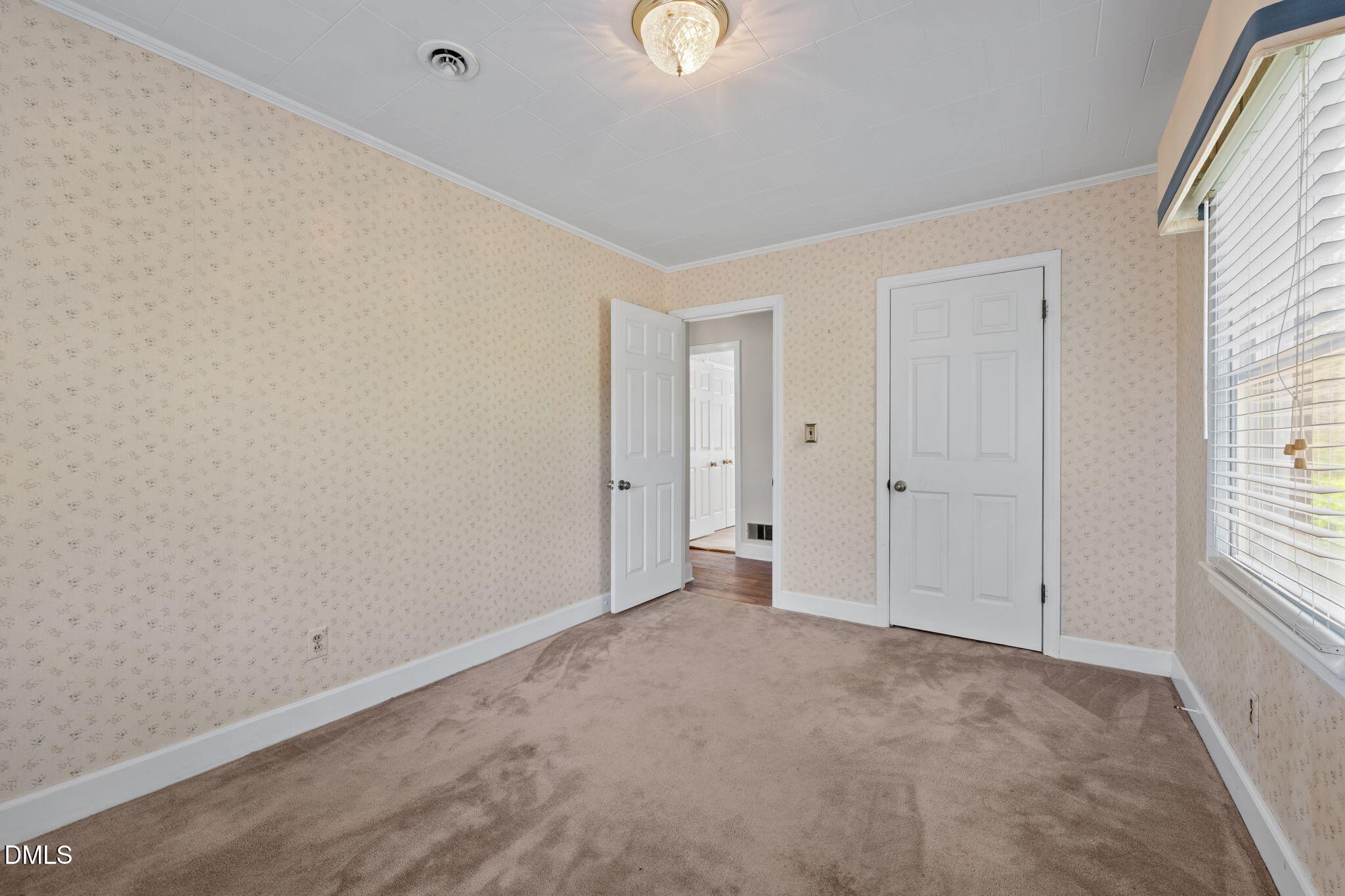 2251 Castle Rock Farm Road Pittsboro, NC 27312 - Photo 37 of 78 a view of an empty room with a window
