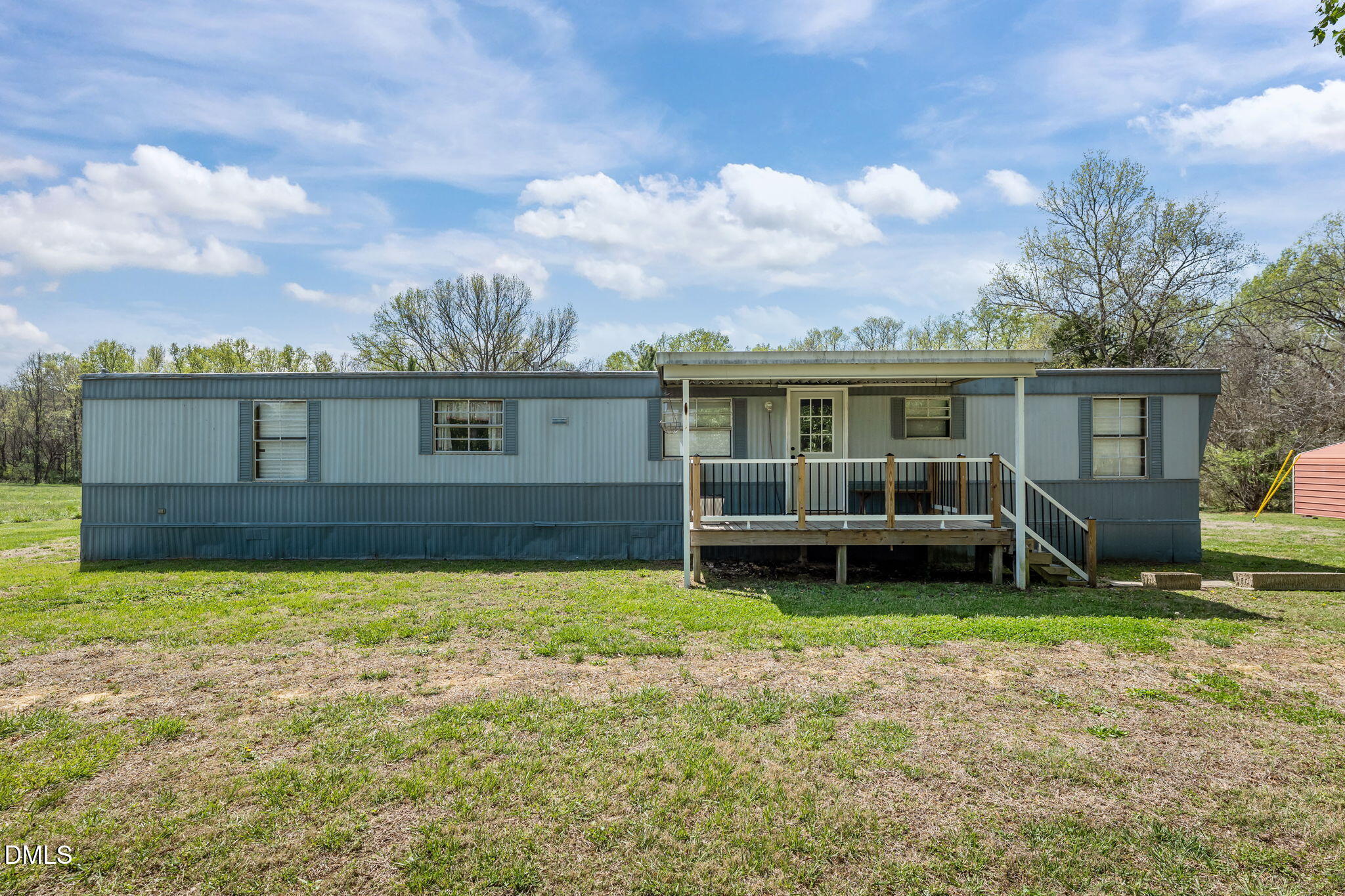 2251 Castle Rock Farm Road Pittsboro, NC 27312 - Photo 39 of 78 a view of a house with a yard in front of it