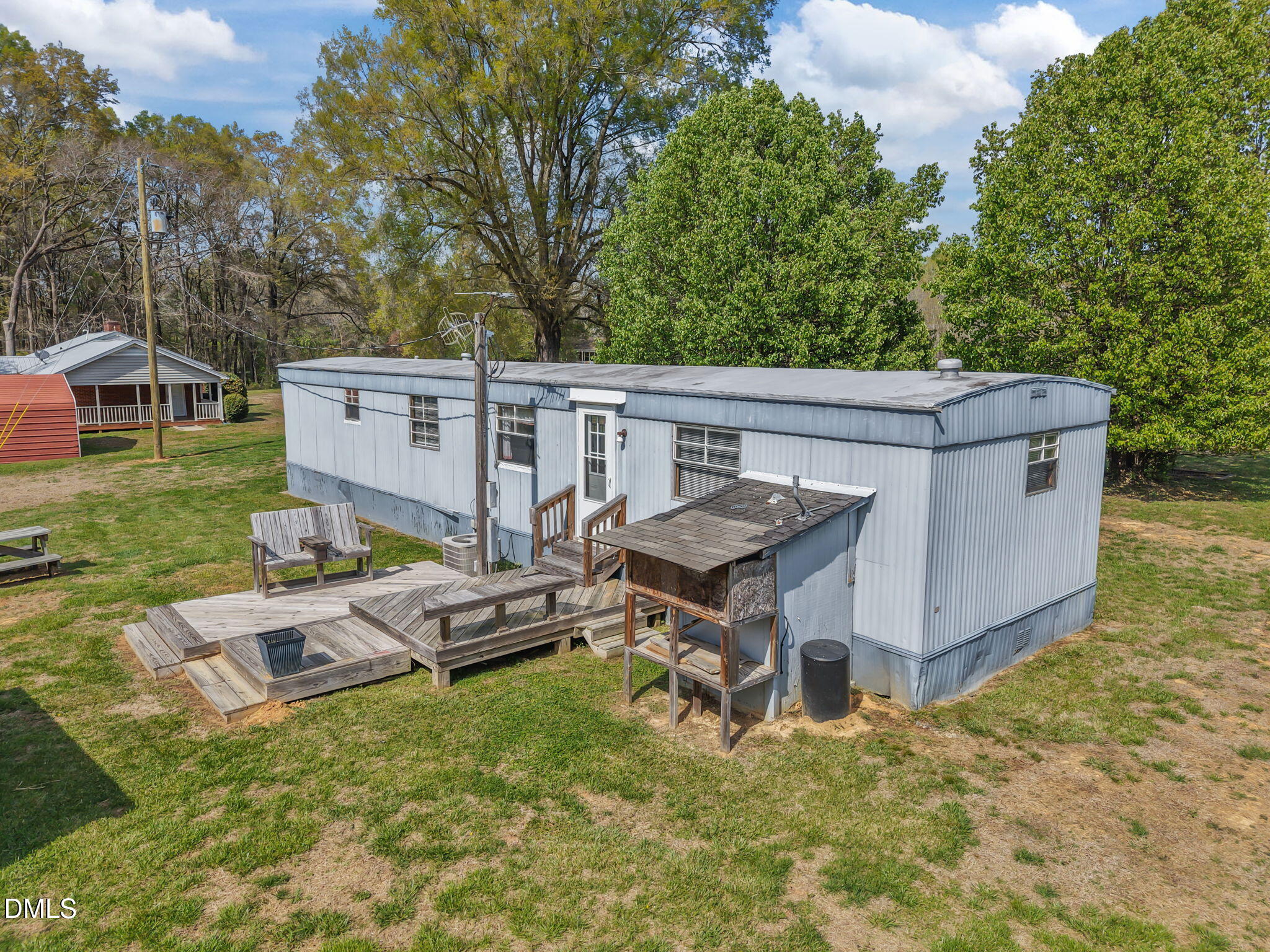 2251 Castle Rock Farm Road Pittsboro, NC 27312 - Photo 41 of 78 an aerial view of a house having patio with a garden