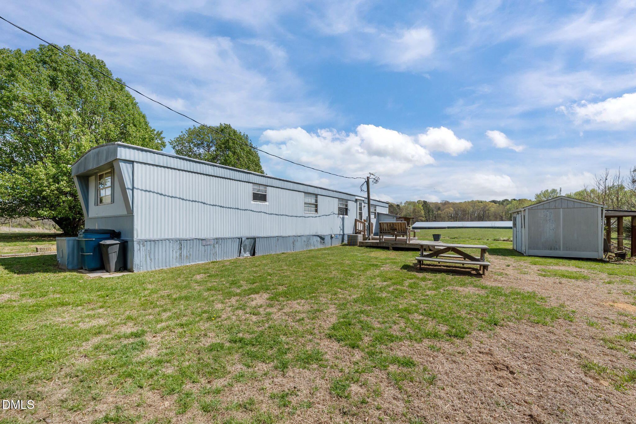 2251 Castle Rock Farm Road Pittsboro, NC 27312 - Photo 46 of 78 a view of a backyard with sitting area