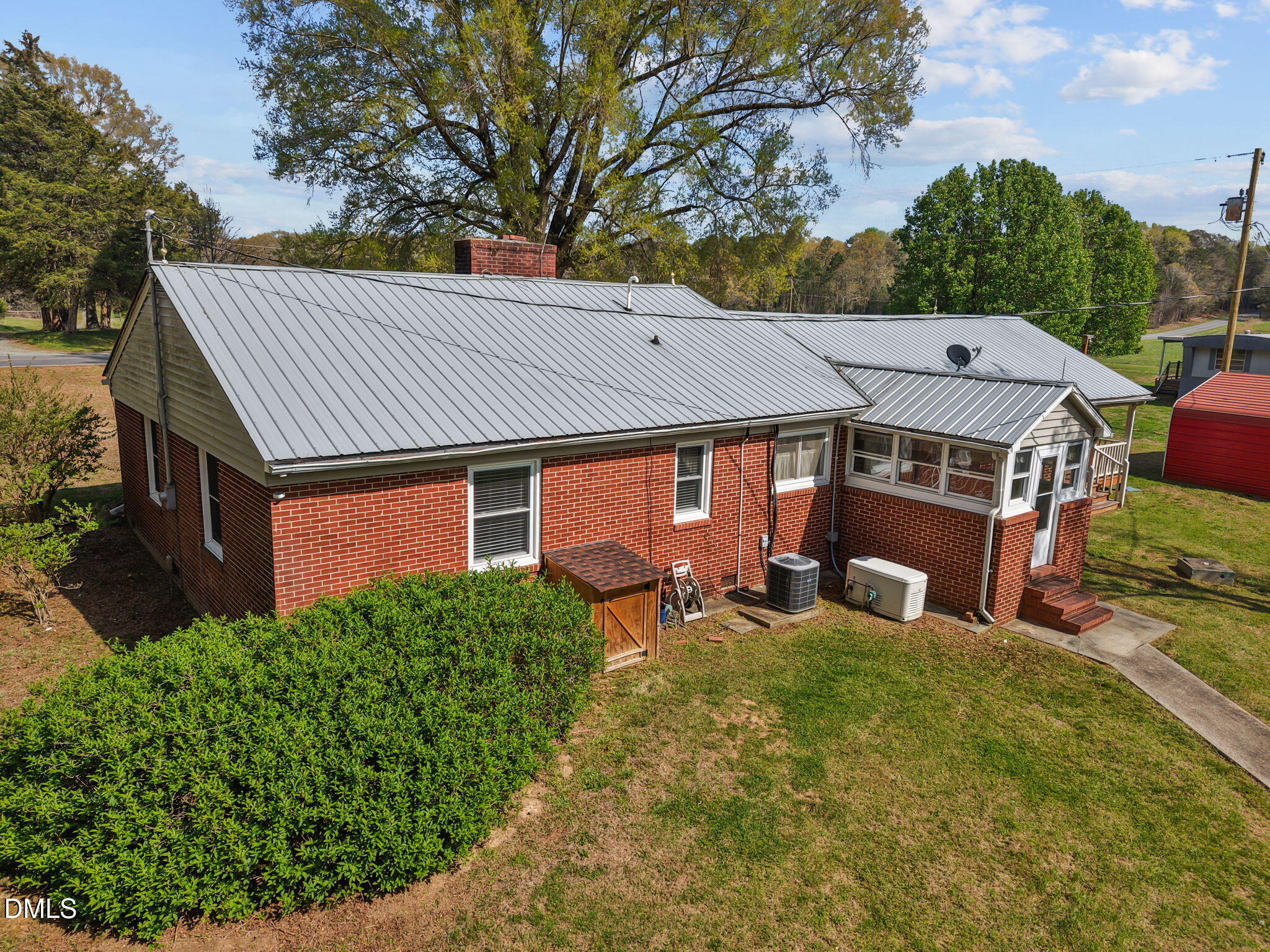 2251 Castle Rock Farm Road Pittsboro, NC 27312 - Photo 5 of 78 front view of a house with a yard