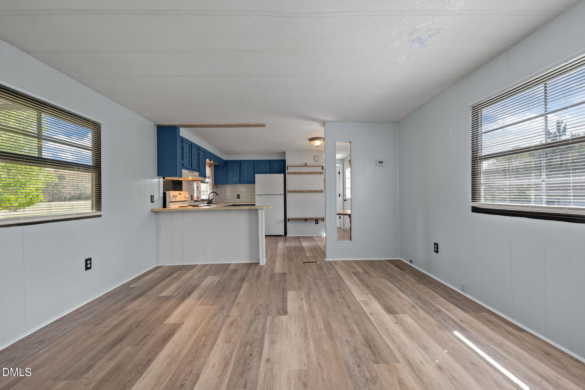 2251 Castle Rock Farm Road Pittsboro, NC 27312 - Photo 52 of 78 a view of kitchen and wooden floor
