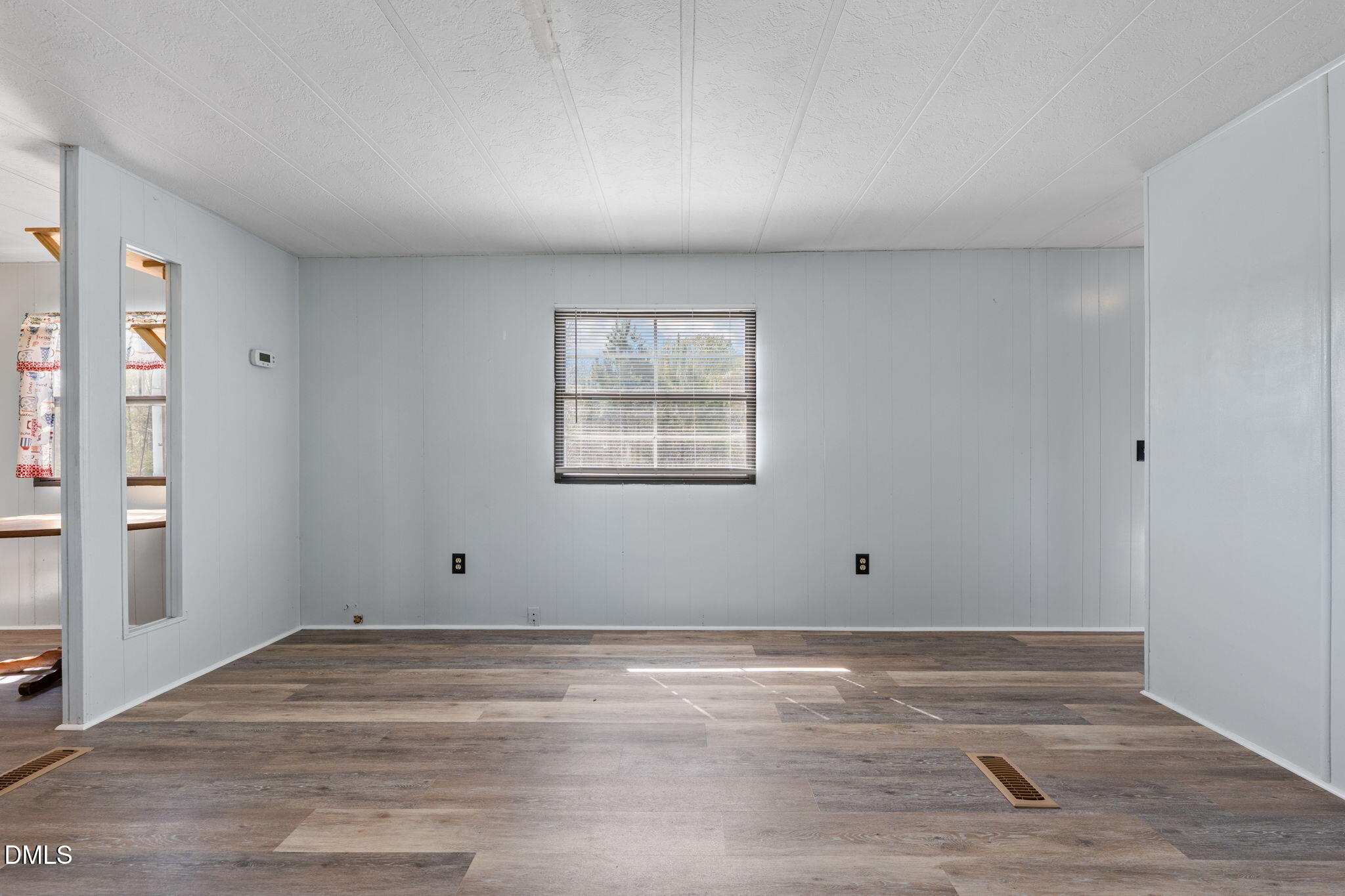 2251 Castle Rock Farm Road Pittsboro, NC 27312 - Photo 70 of 78 a view of empty room with wooden floor