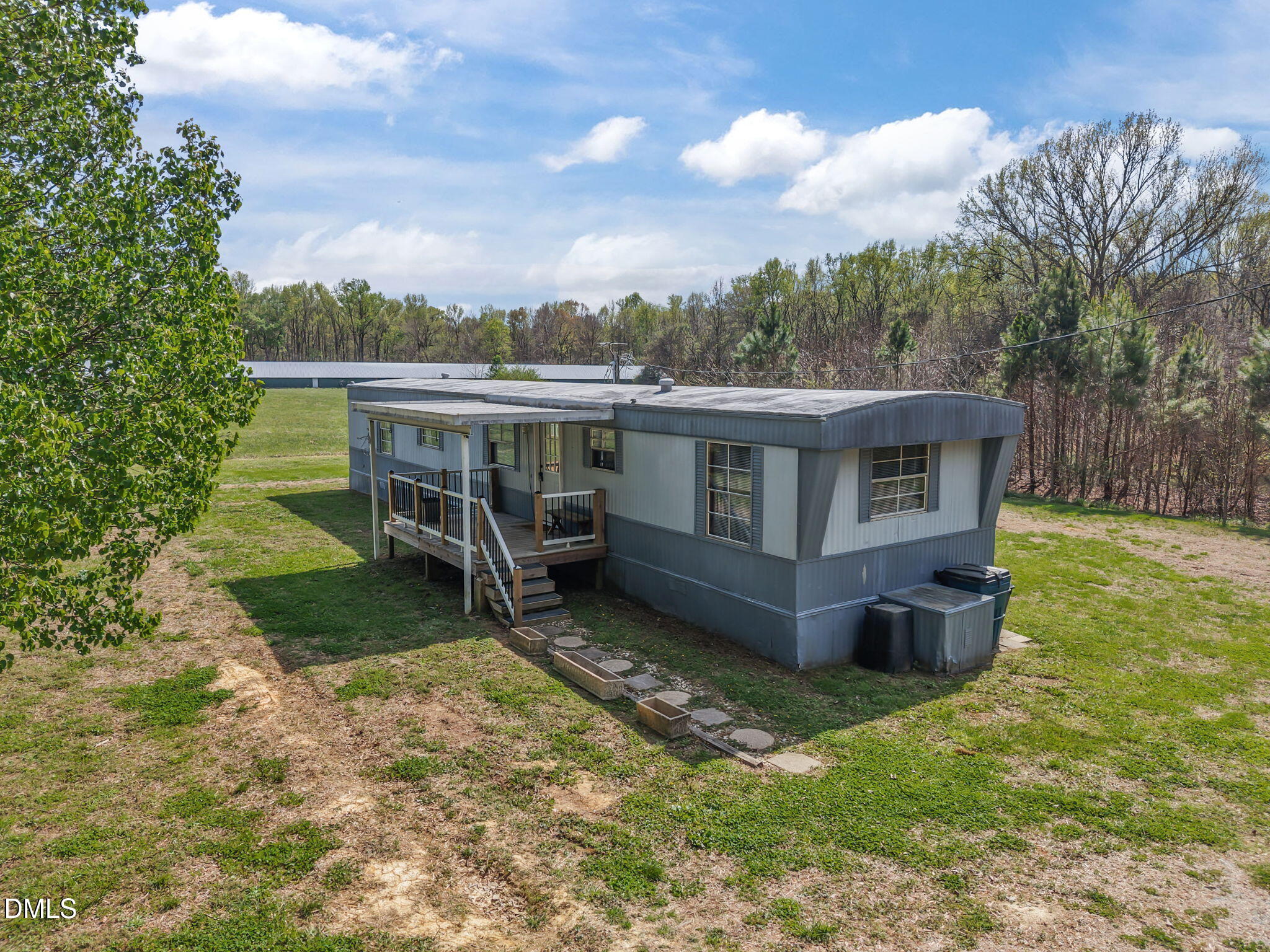 2251 Castle Rock Farm Road Pittsboro, NC 27312 - Photo 71 of 78 a view of a house with a yard