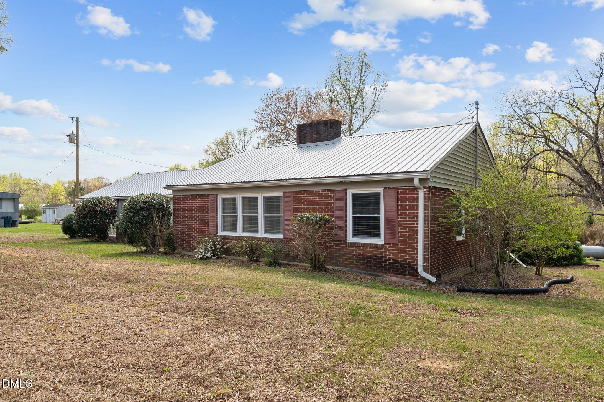 2251 Castle Rock Farm Road Pittsboro, NC 27312 - Photo 9 of 78 a view of a house with a yard
