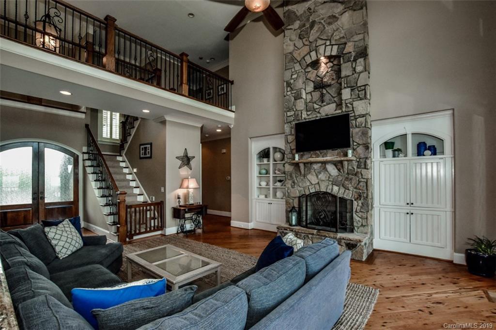 300 Ervin Road Mooresville, NC 28117 - Photo 14 of 32 a living room with furniture and a fireplace