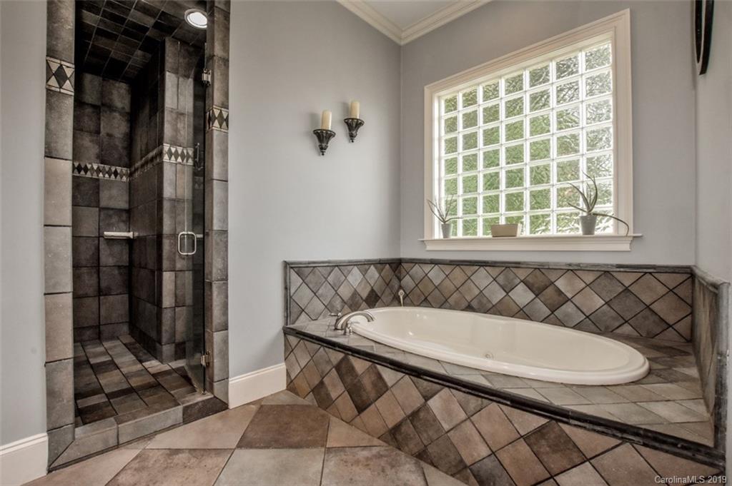 300 Ervin Road Mooresville, NC 28117 - Photo 18 of 32 a bathroom with a sink and a mirror