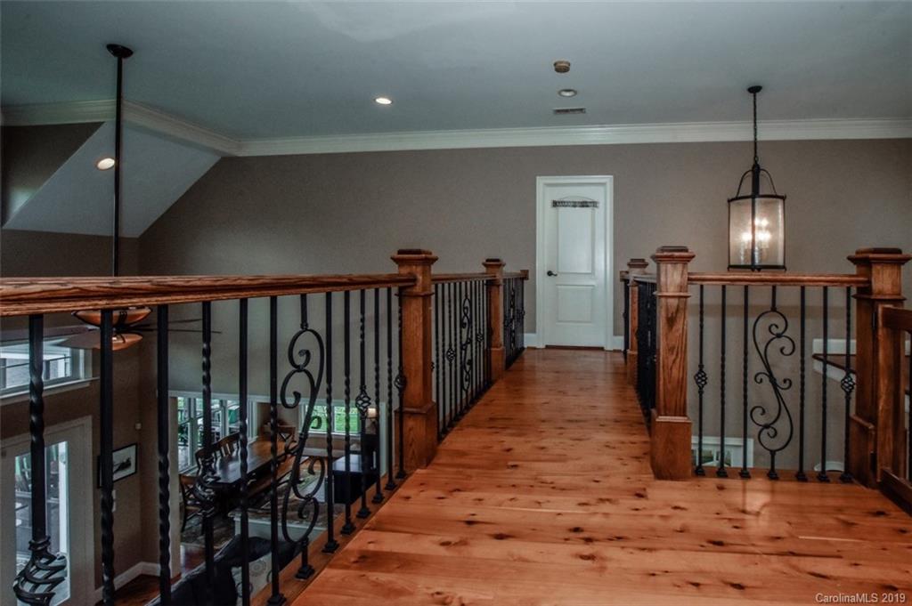 300 Ervin Road Mooresville, NC 28117 - Photo 20 of 32 a view of hallway with wooden floor