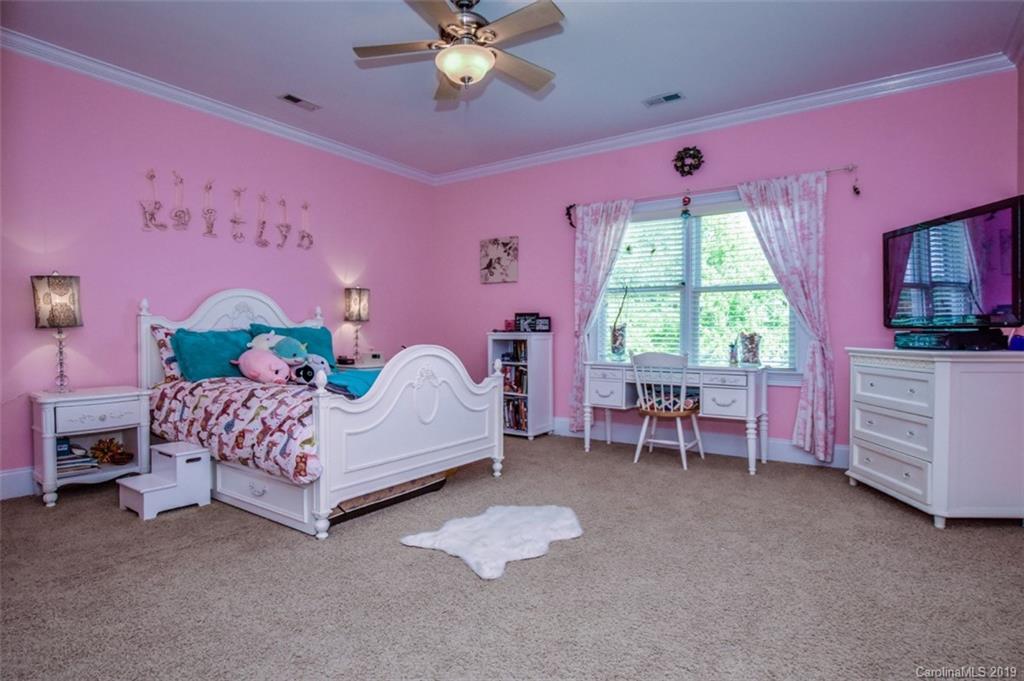 300 Ervin Road Mooresville, NC 28117 - Photo 24 of 32 a bedroom with a bed and a window