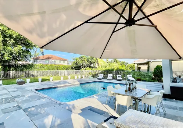 a view of yard with patio