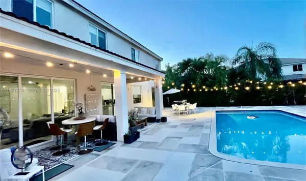 a front view of house with yard and seating area