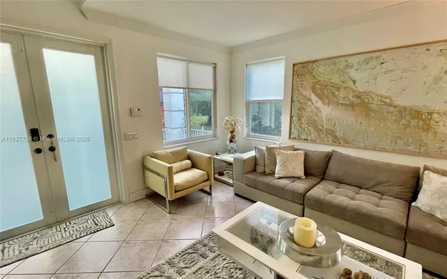 a living room with furniture and a rug