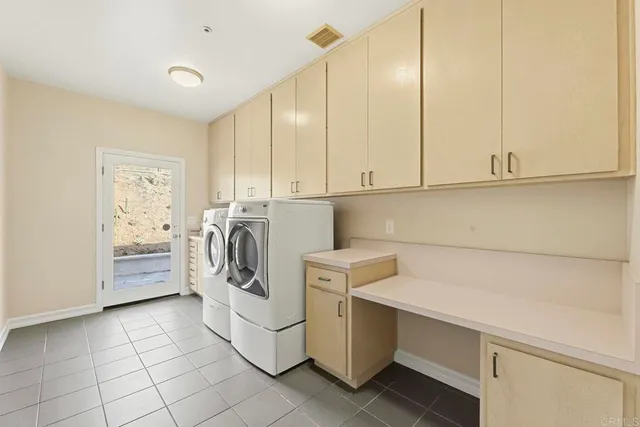 a front view of a house with a mountain