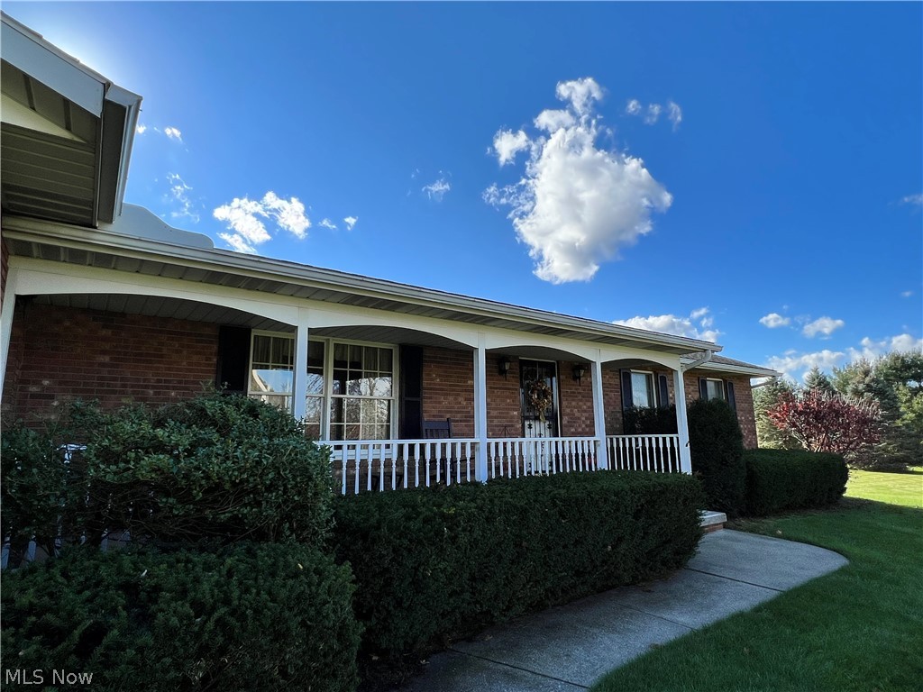 8160 Greenwich Road Lodi, OH 44254 - Photo 4 of 29 Extra large front porch. Brick front.