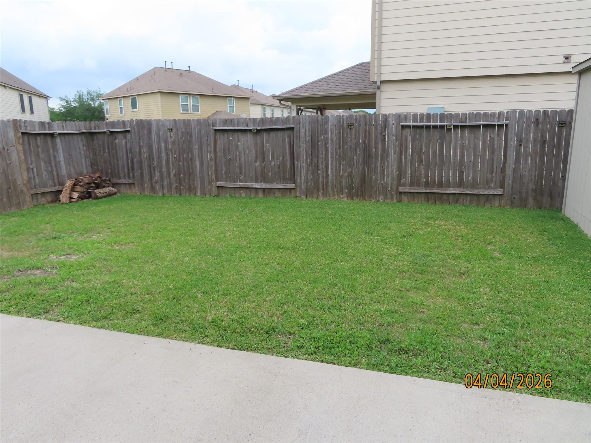 15631 South Fall Fern Circle Houston, TX 77044 - Photo 21 of 25 Spacious backyard with a storage shed, perfect for tools, equipment, and extra storage needs.