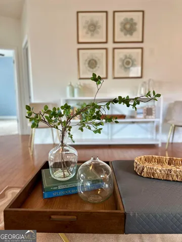 a view of a vase of flowers sitting on a table