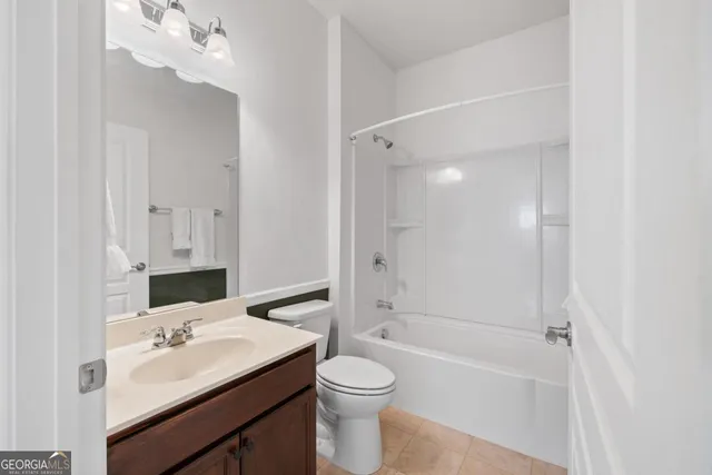 a view of a kitchen from the hallway