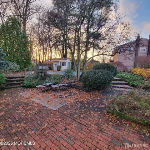 a backyard of a house with lots of green space