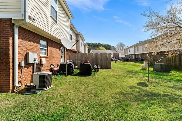 a view of a back yard of the house