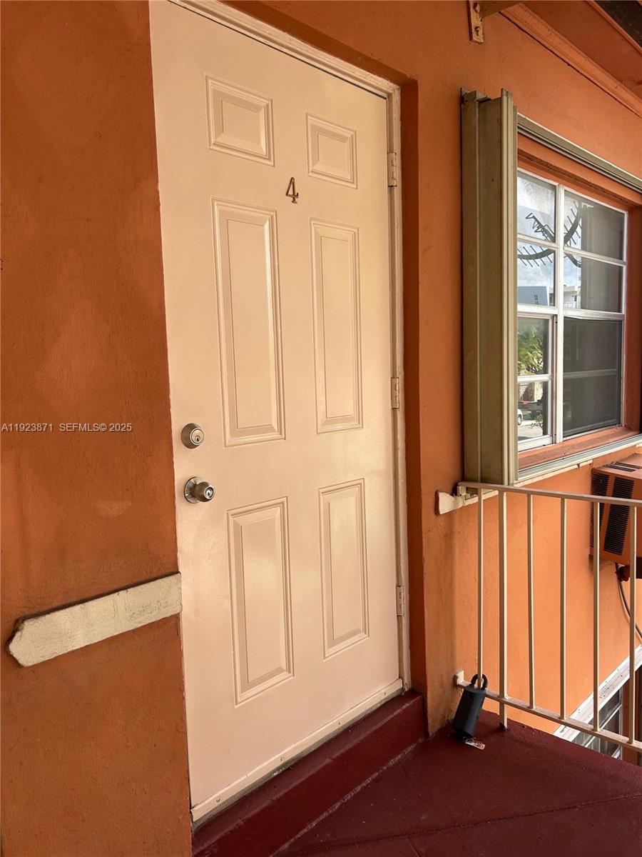 3400 Southwest 9th Terrace, Unit 2B Miami, FL 33135 - Photo 23 of 25 an entryway with wooden floor