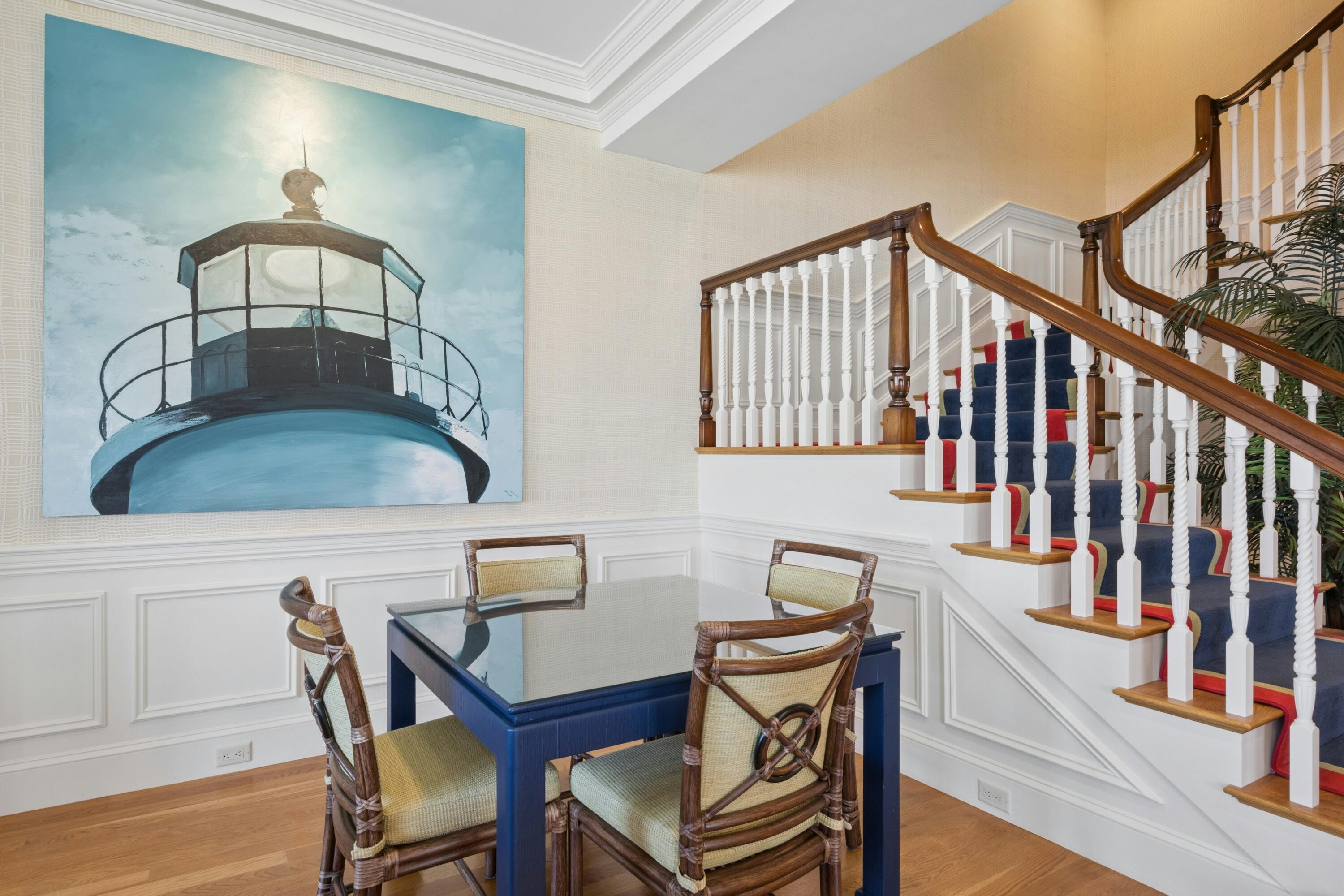 23 Snow Inn Road, Unit 7 Harwich Port, MA 02646 - Photo 10 of 37 a view of a dining room with furniture and a wooden floor
