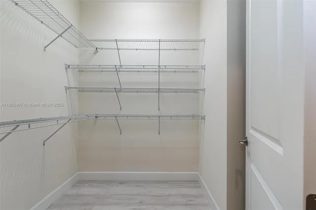 a view of a room with racks on the wall