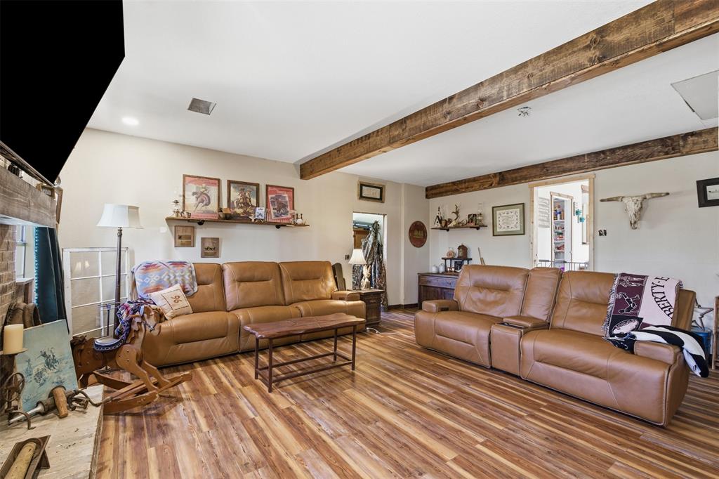 8145 Blair Road Northlake, TX 76247 - Photo 11 of 34 a living room with furniture and a flat screen tv
