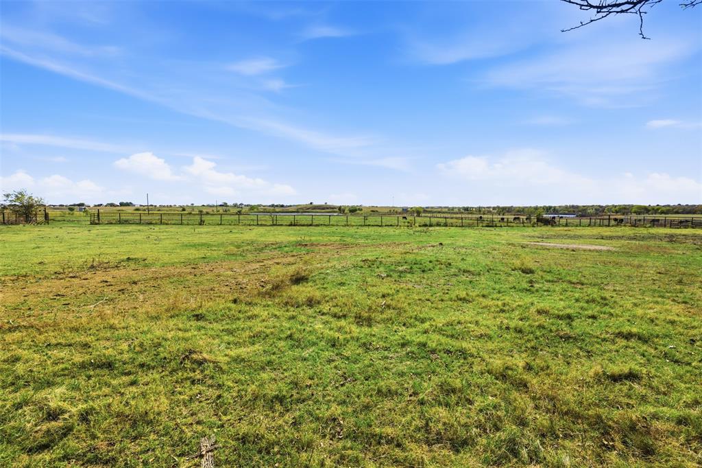 8145 Blair Road Northlake, TX 76247 - Photo 22 of 34 a view of a lake and a yard