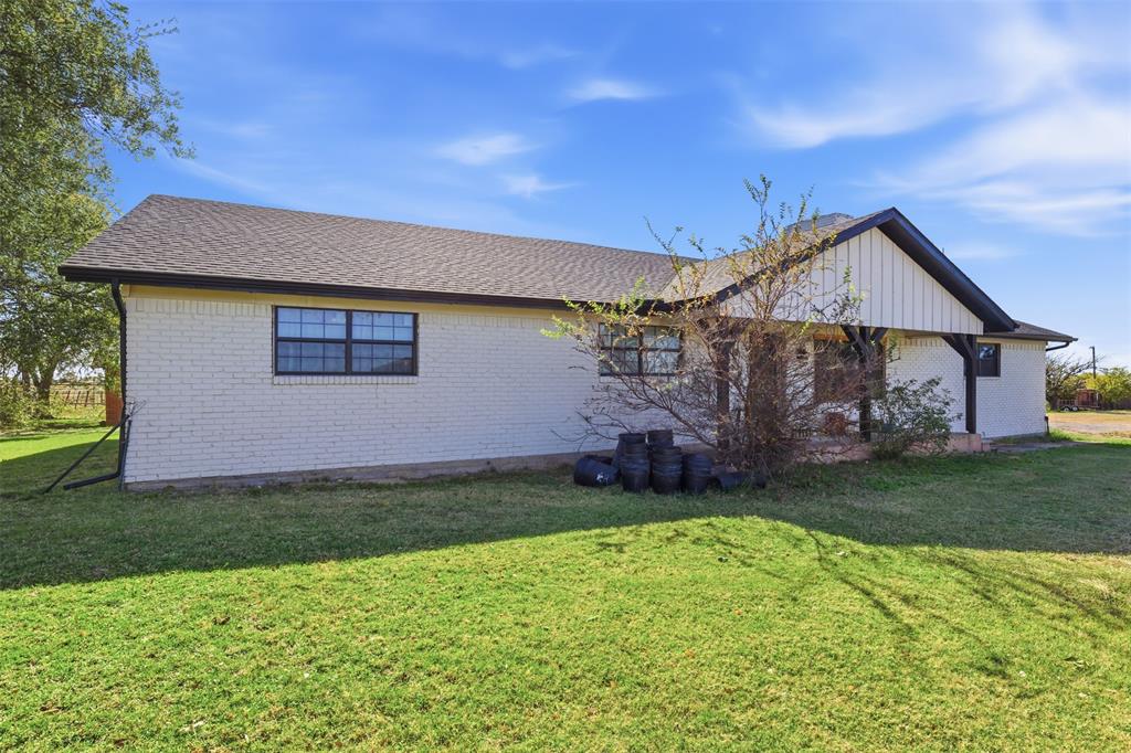 8145 Blair Road Northlake, TX 76247 - Photo 5 of 34 a front view of a house with a garden