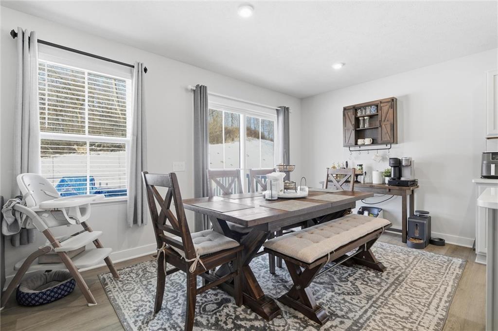 412 Spruce Lane Houston, PA 15342 - Photo 23 of 44 The dining area spills out onto a maintenance-free deck...
