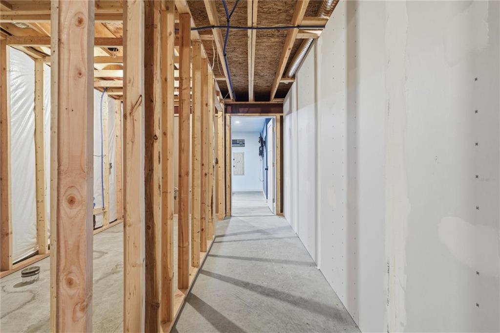 412 Spruce Lane Houston, PA 15342 - Photo 37 of 44 This hall leads from the game room to the bath and office...