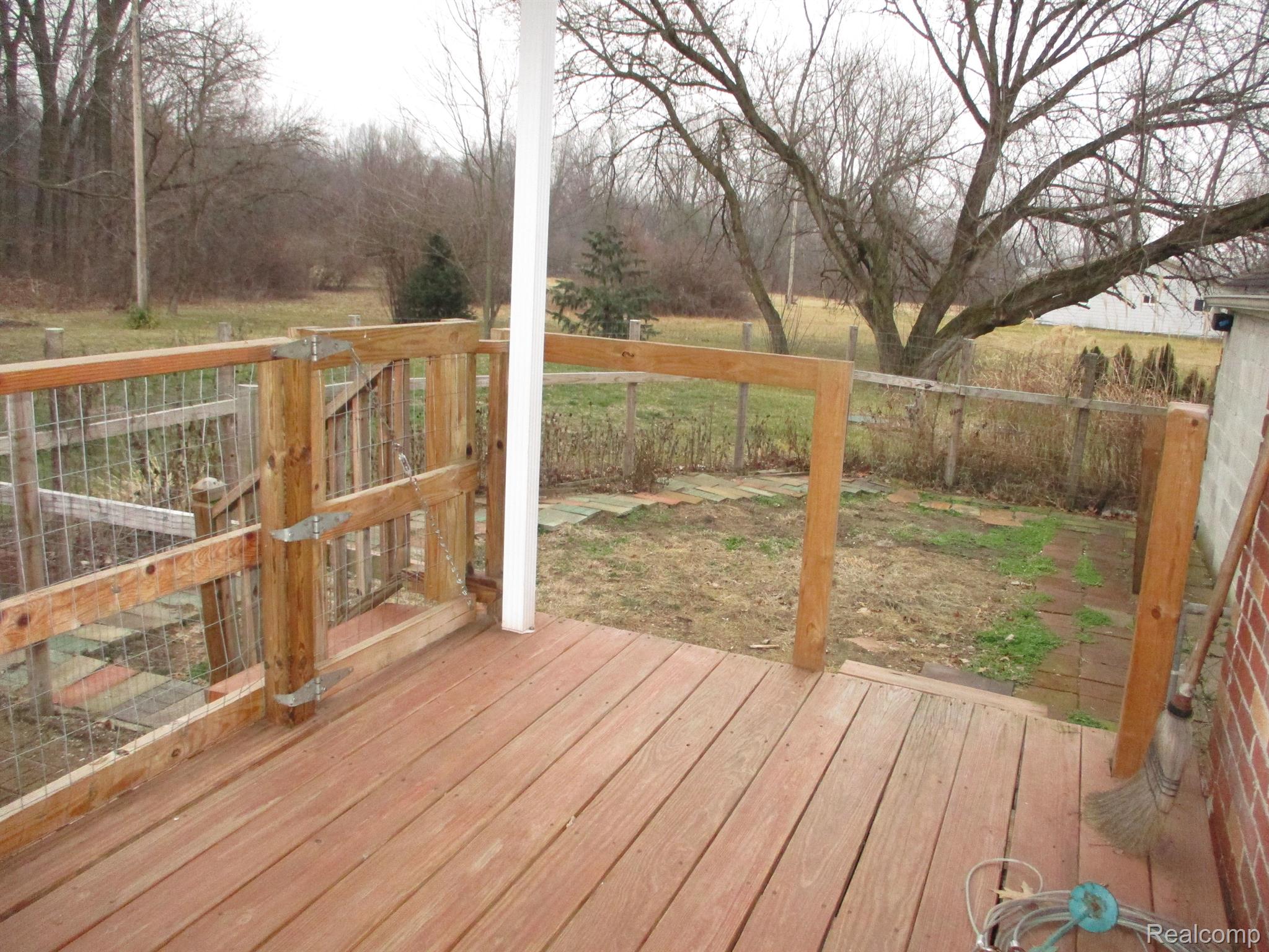 42360 Willow Road New Boston, MI 48164 - Photo 32 of 49 Back porch and a fenced area for pets.