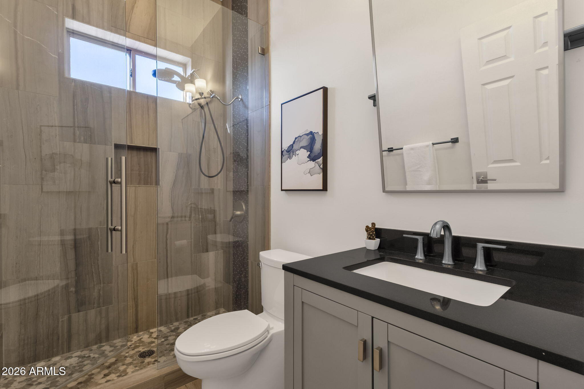 14604 East Peak View Road Scottsdale, AZ 85262 - Photo 17 of 55 a bathroom with a sink a toilet and shower