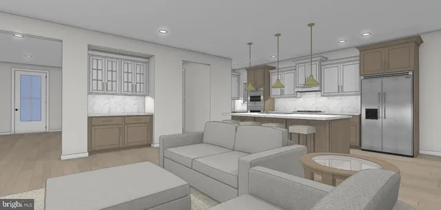 a kitchen with kitchen island white cabinets and refrigerator