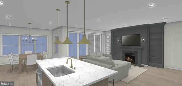 a kitchen with stainless steel appliances granite countertop a sink a oven and a fireplace with wooden floor