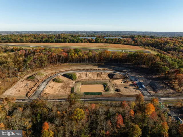 a view of a lake with a city