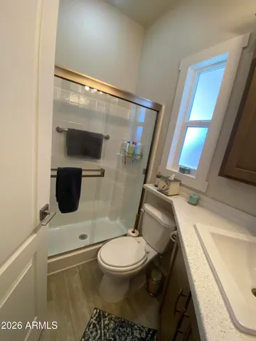 a view of balcony with two chairs and a table