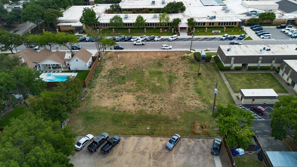 717 East Worth Street Grapevine, TX 76051 - Photo 11 of 18 an aerial view of a swimming pool with outdoor seating