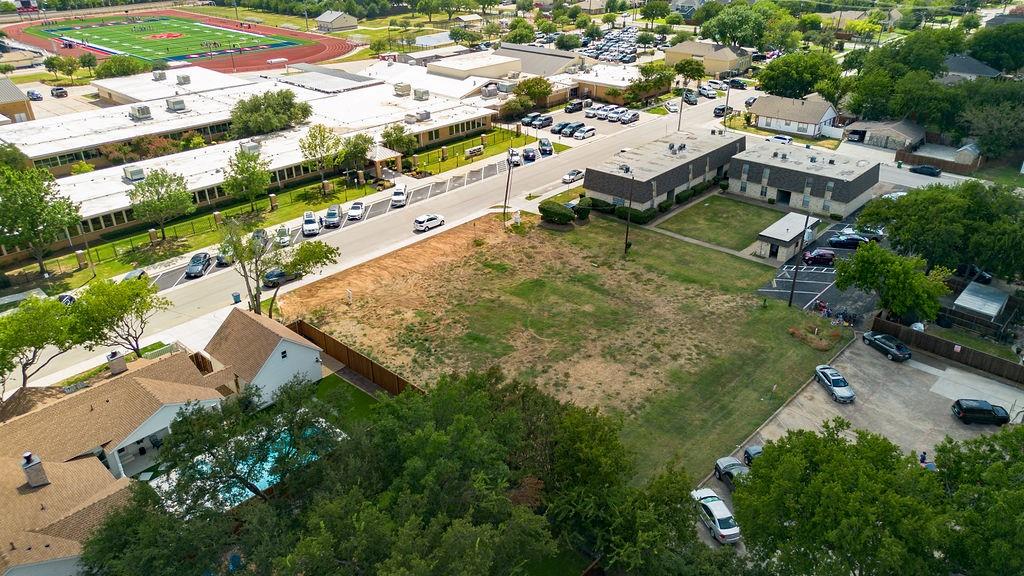717 East Worth Street Grapevine, TX 76051 - Photo 15 of 18 an aerial view of residential houses with outdoor space