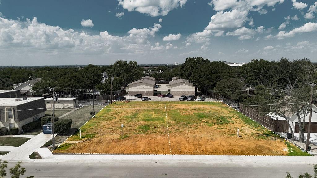 717 East Worth Street Grapevine, TX 76051 - Photo 16 of 18 a swimming pool with trees in the background
