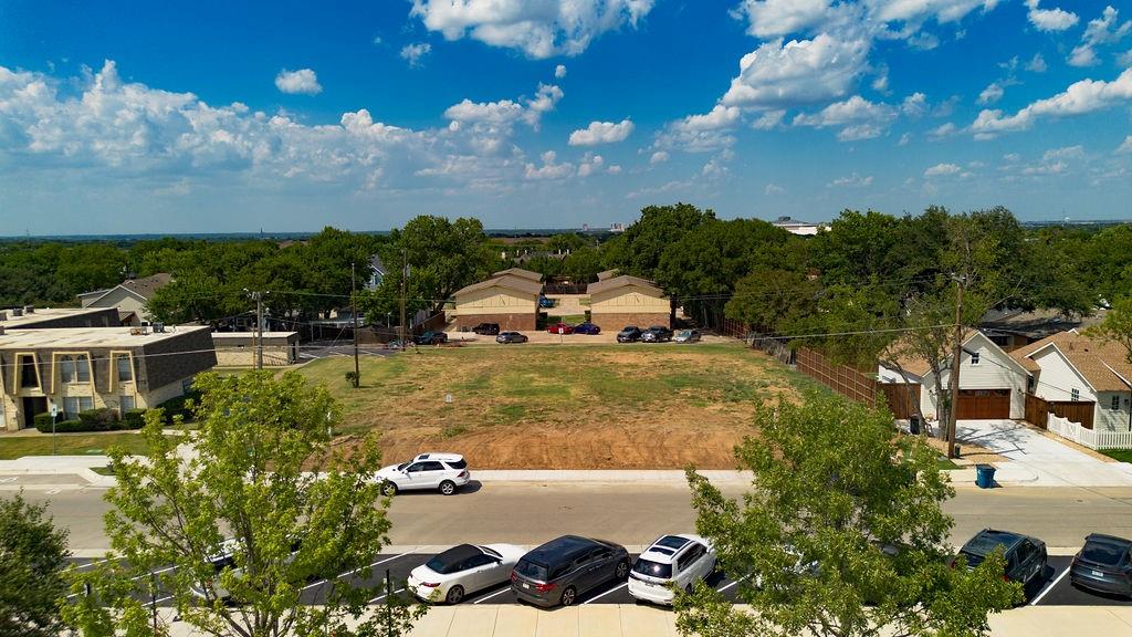 717 East Worth Street Grapevine, TX 76051 - Photo 17 of 18 a view of a lake with houses