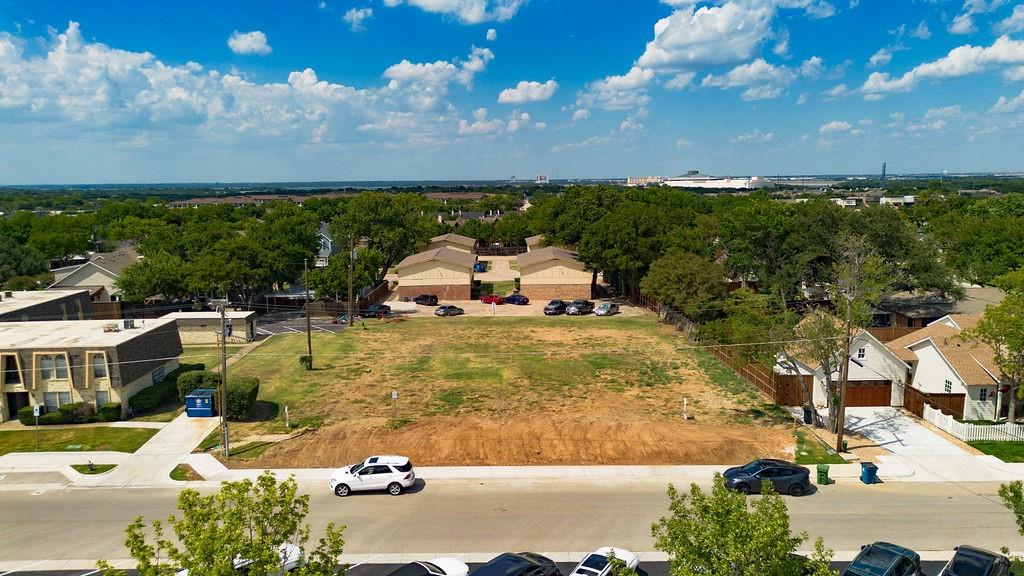 717 East Worth Street Grapevine, TX 76051 - Photo 18 of 18 a view of a yard with table and chairs