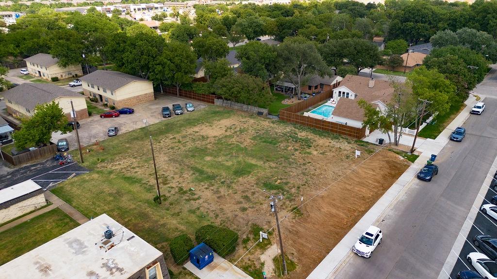 717 East Worth Street Grapevine, TX 76051 - Photo 4 of 18 an aerial view of a house with a yard